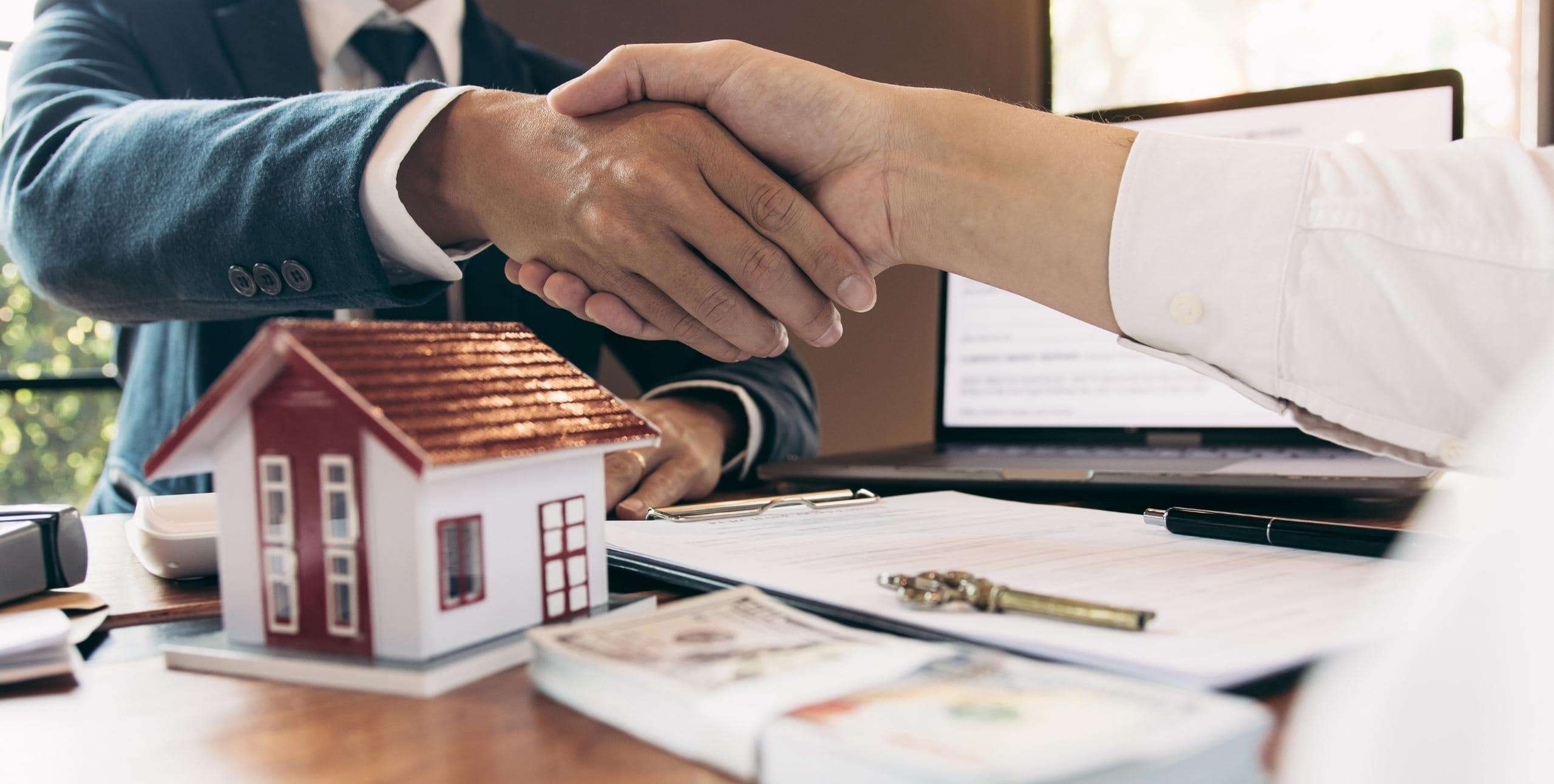 Real estate partnership handshake